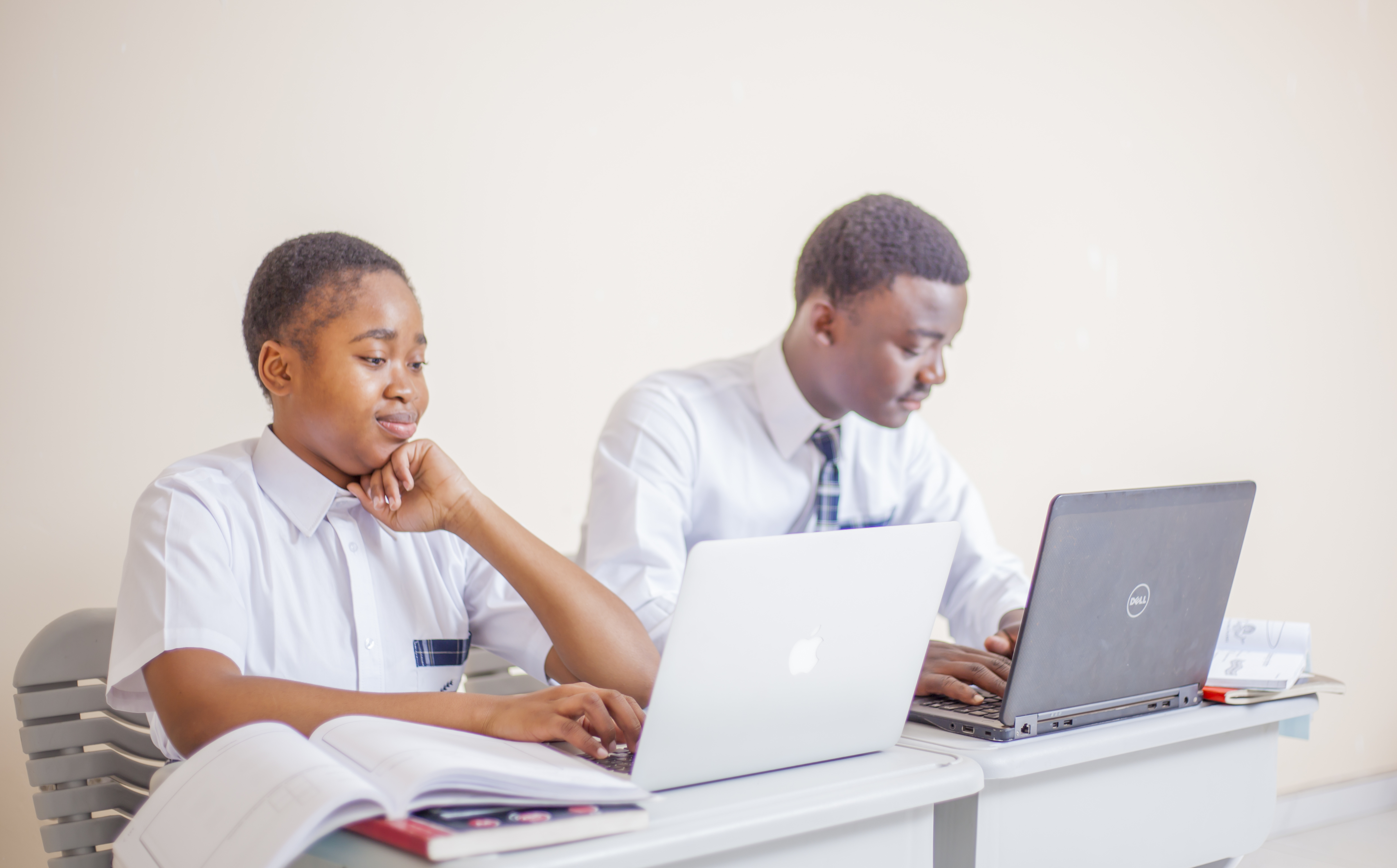 Students on laptops in class